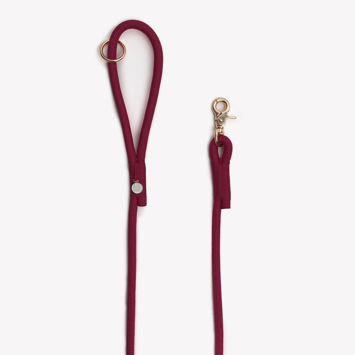 Maroon dog leash with gold clasp on a white background