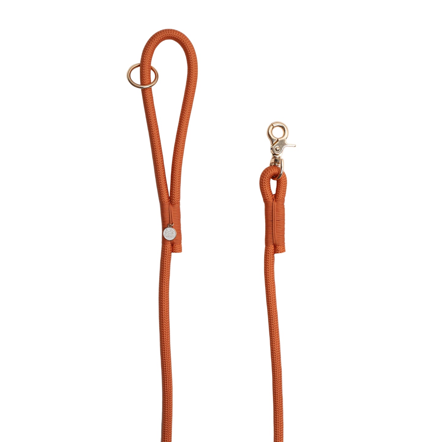 Orange brown dog leash with gold hardware on a white background