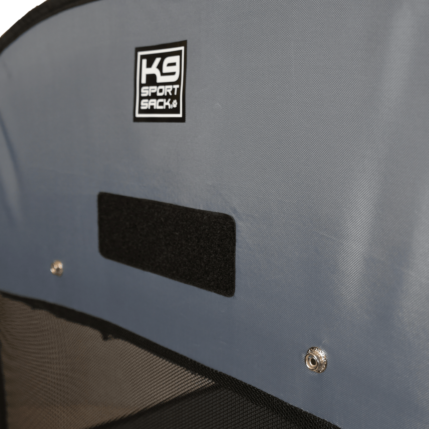 Gray backpack with K9 Sport logo on a gray background