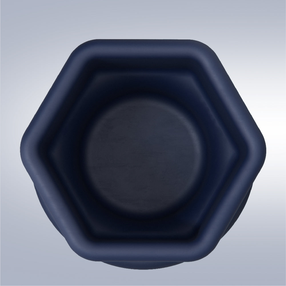 Hexagonal dark blue container on a light gray background