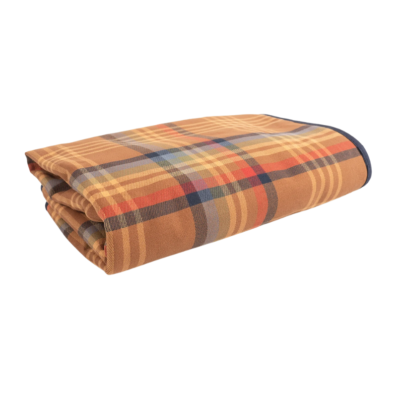Folded plaid blanket with autumn colors on a white background