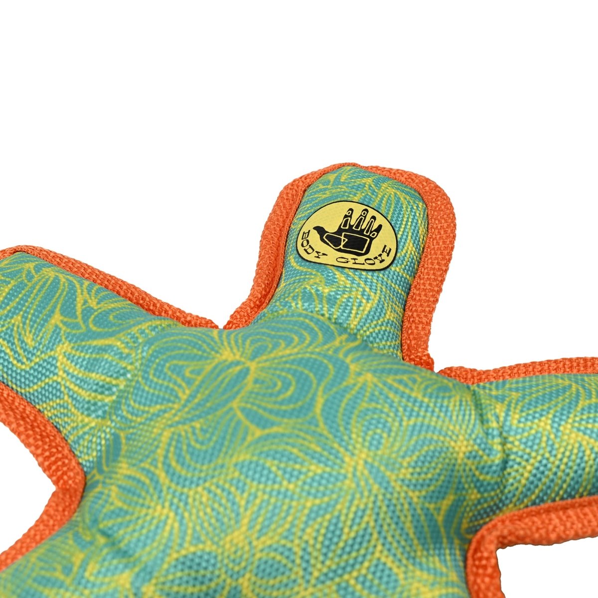 Star-shaped toy with orange edges and a pattern on a white background