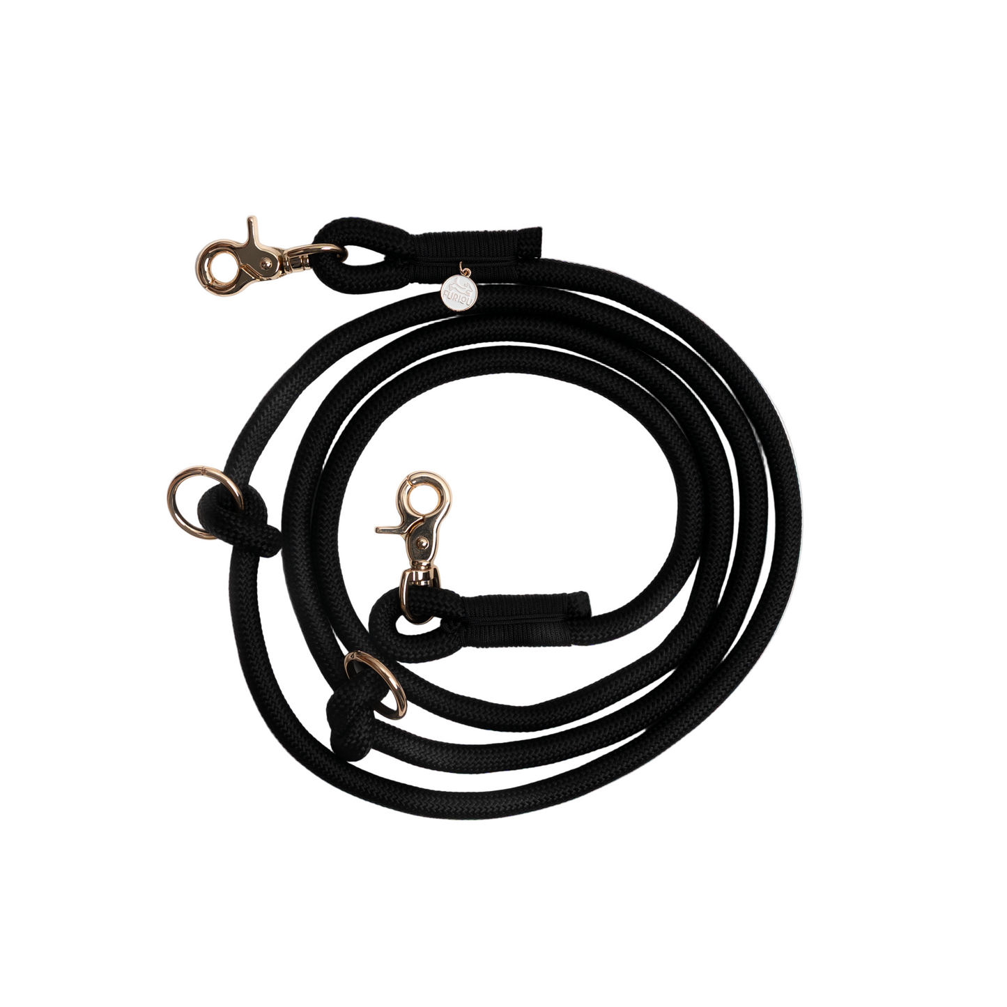 Black dog leash with gold clasp on a white background