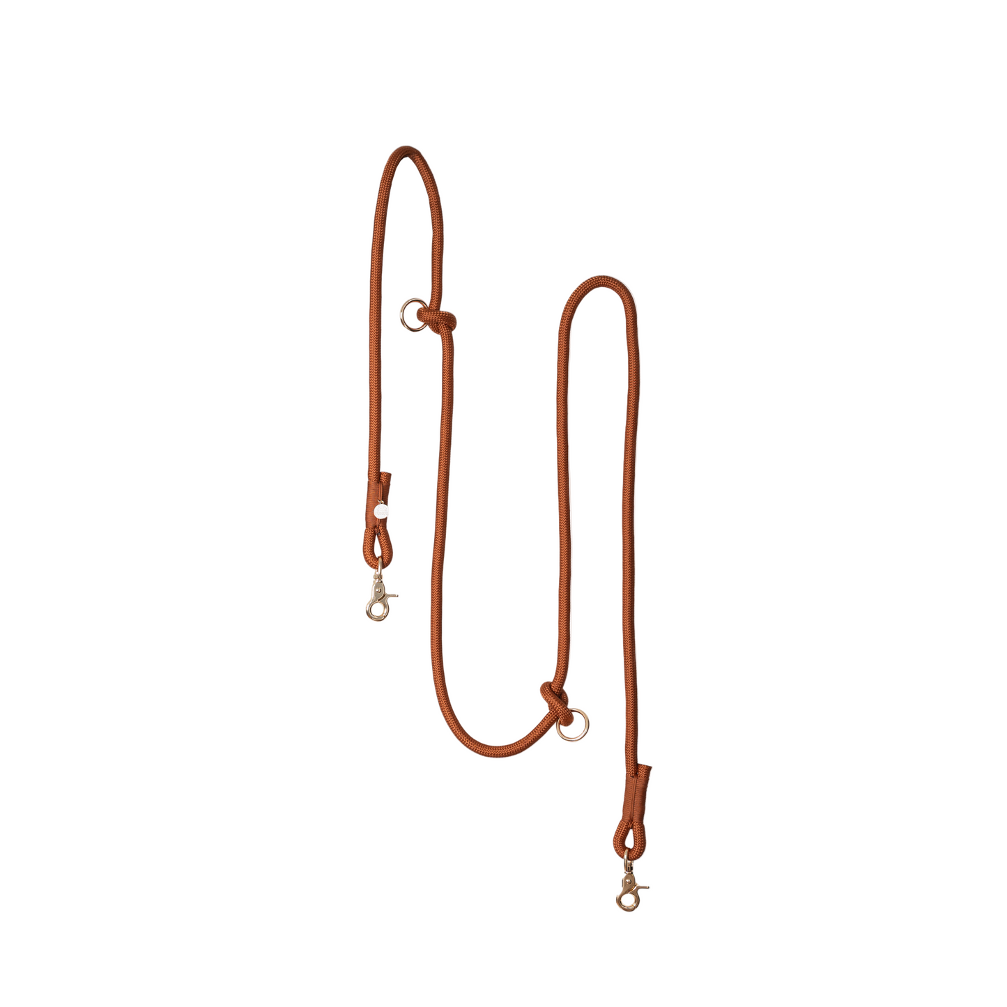 Brown leather dog leash on a white background