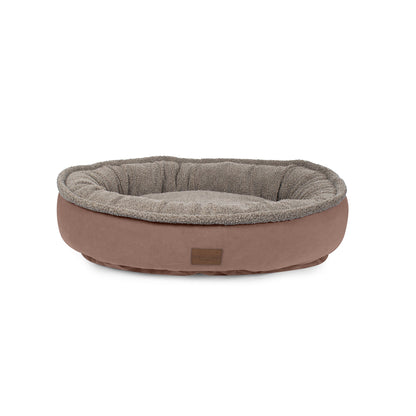 Dog bed with brown exterior and gray interior on a white background