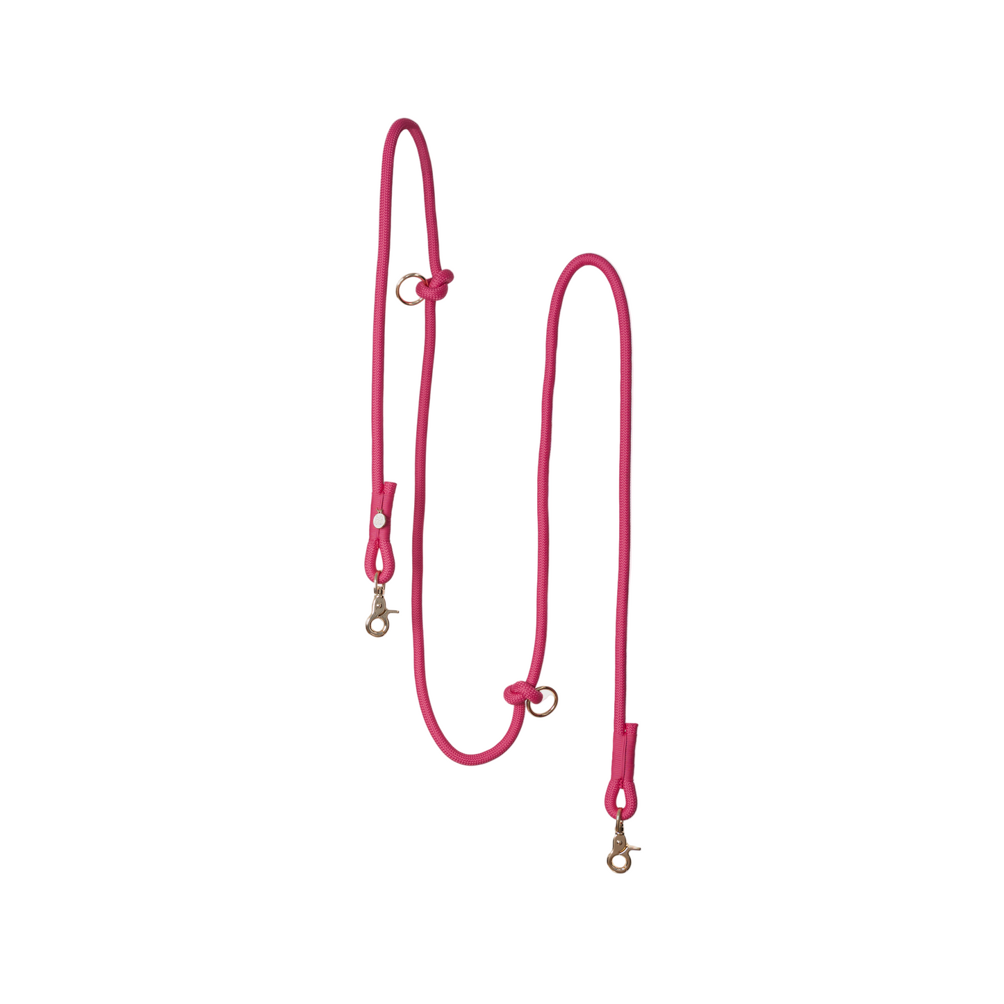 Pink dog leash on a light pink background