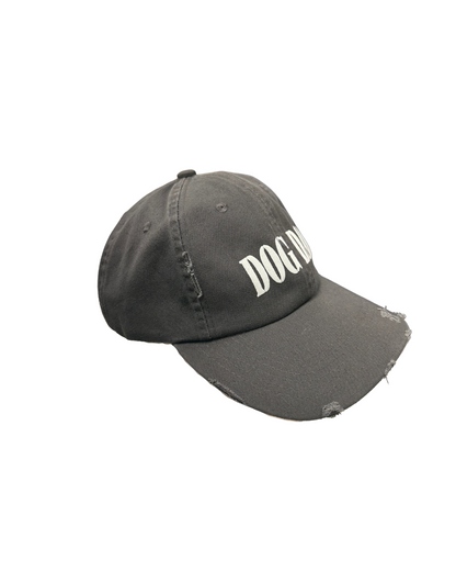 Gray cap with 'DOG DAD' text on a white background