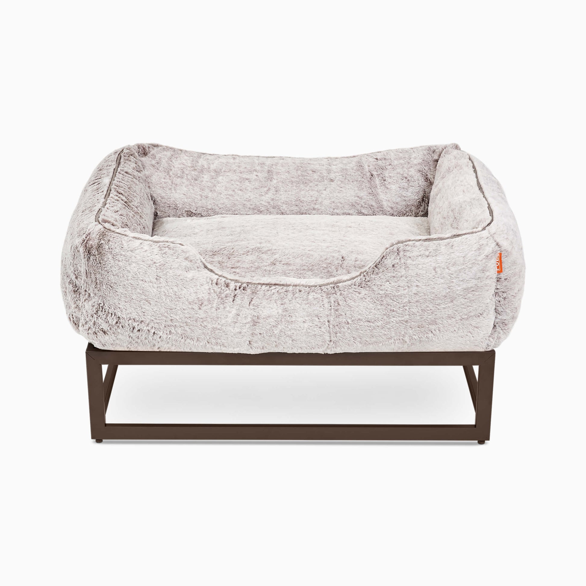 The FÜZI Dog Bed in gray on top of frame on white background