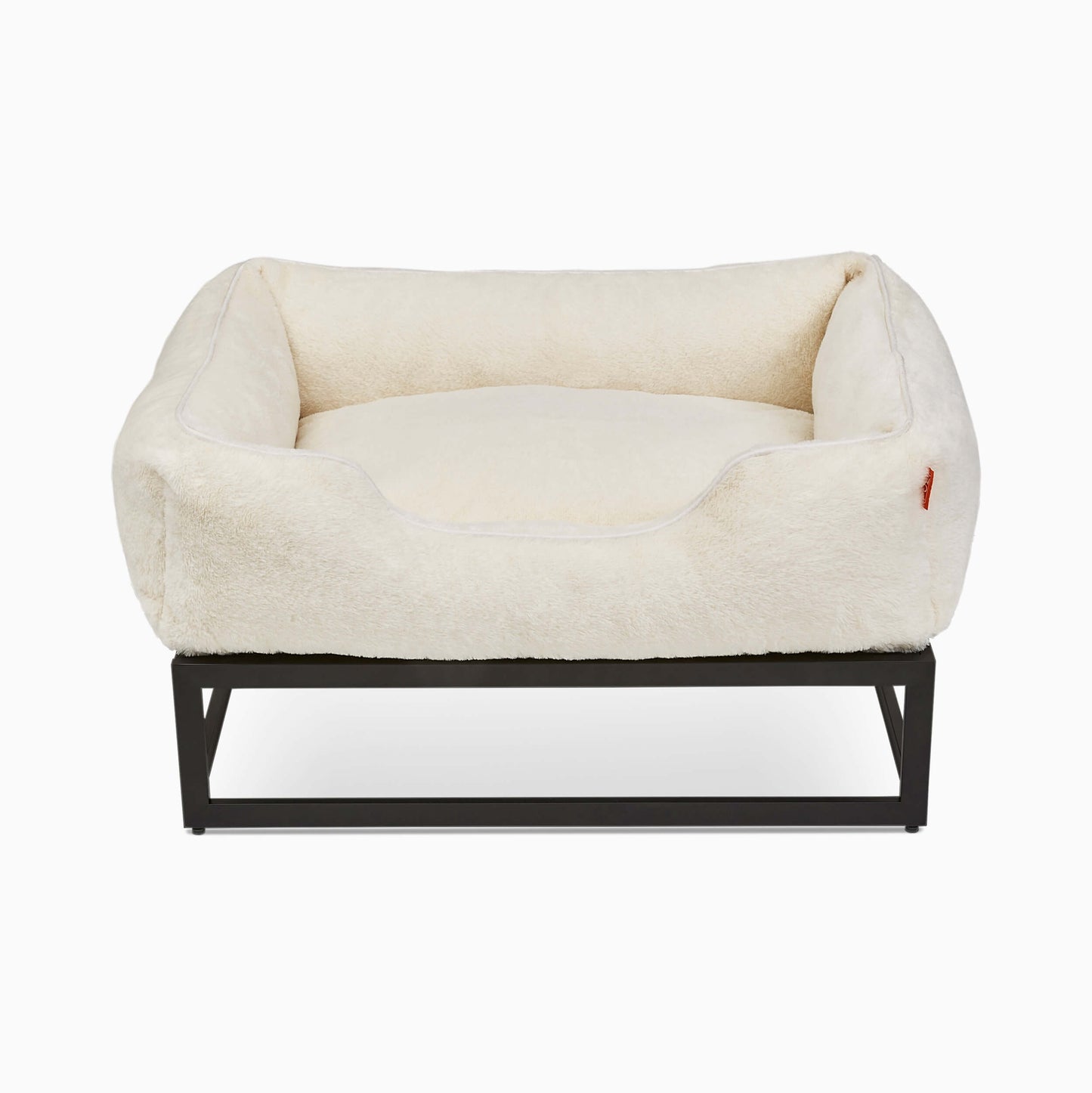 White pet bed with black frame on a white background
