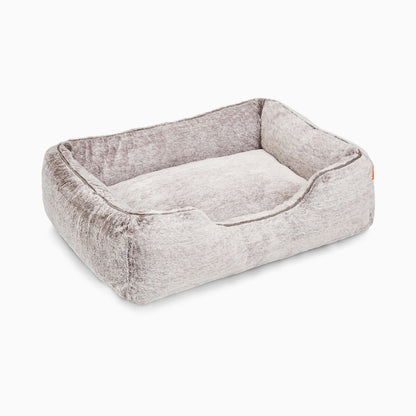 Rectangular pet bed with a plush texture on a white background