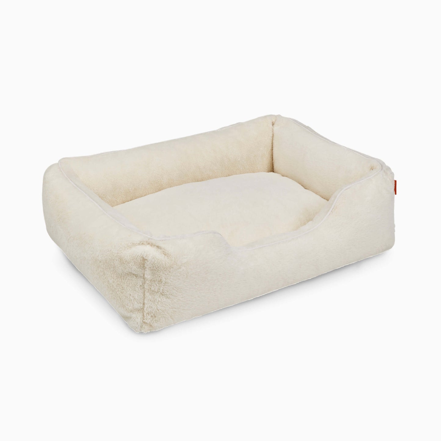 Beige pet bed on a white background