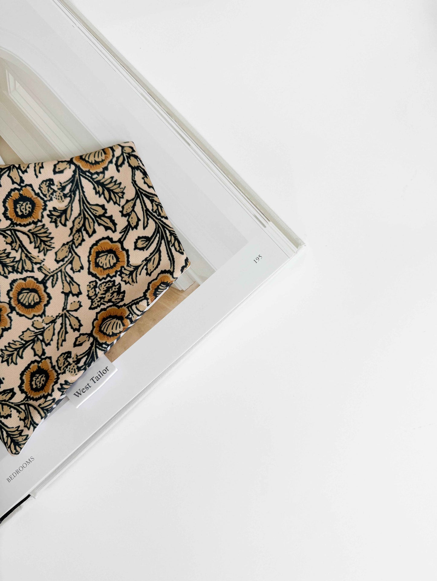 Floral dog bandana in a white frame on a light background