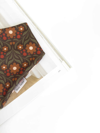 Floral patterned dog bandana on a white background