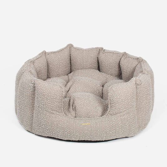 Textured gray pet bed on a white background