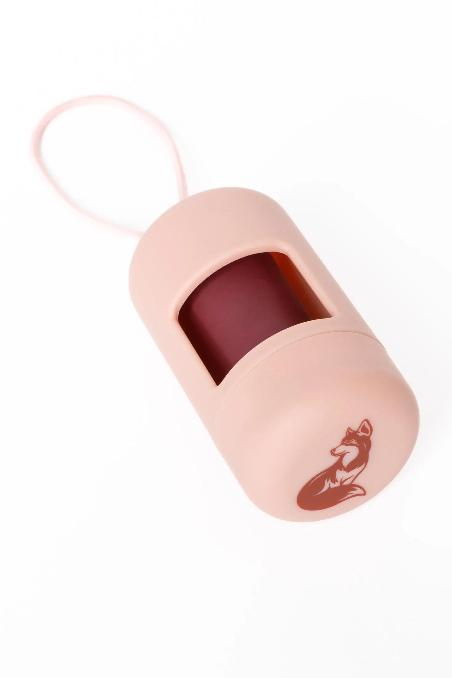 Pink dog waste bag holder case with a fox design on a white background