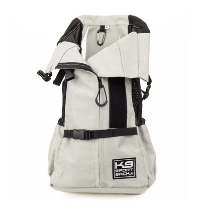 Light gray backpack with black straps and carabiners on a white background