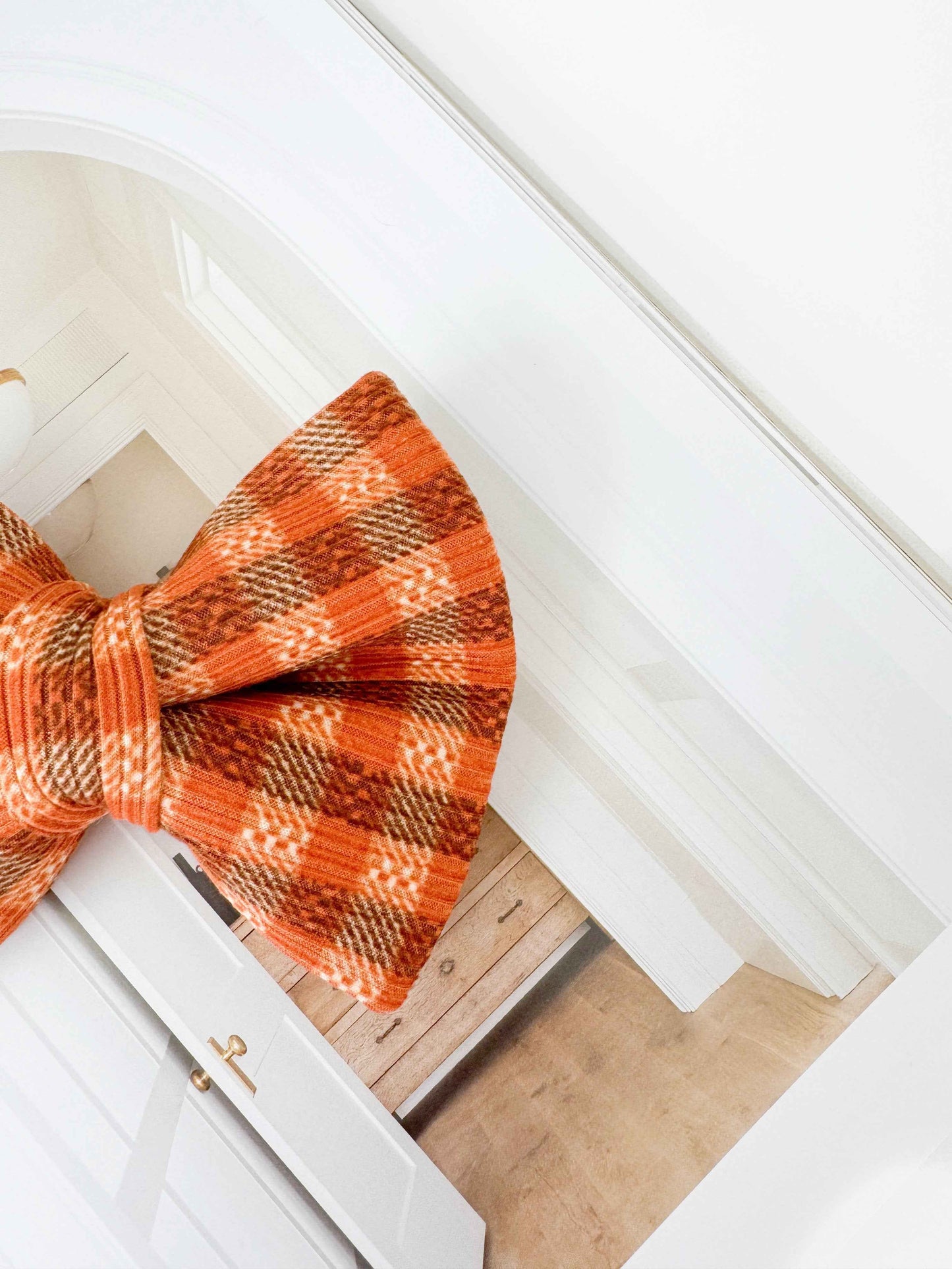 Plaid bow tie on a white background