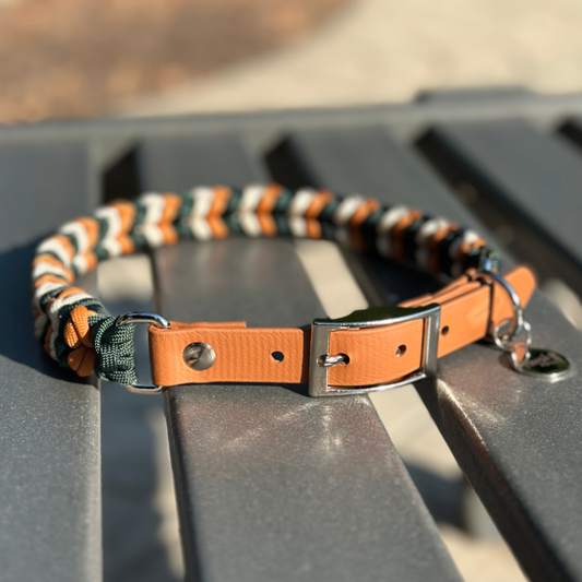 Dog collar with green, dark yellow, and cream braid, and light brown biothane strap