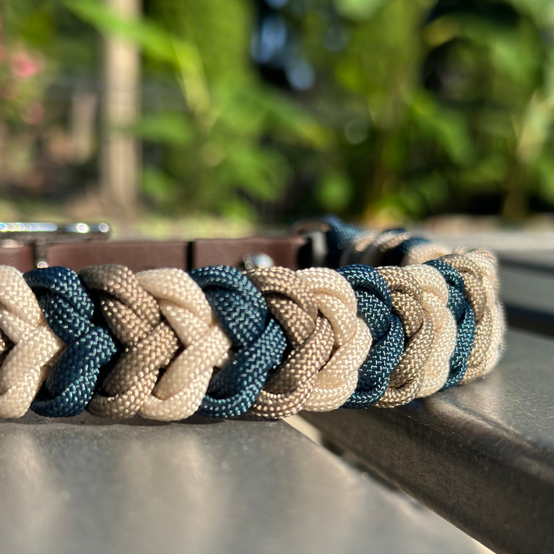 Dog collar with navy blue, tan, and cream braid, with dark brown biothane strap