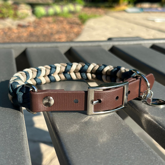 Dog collar with navy blue, tan, and cream braid, with dark brown biothane strap