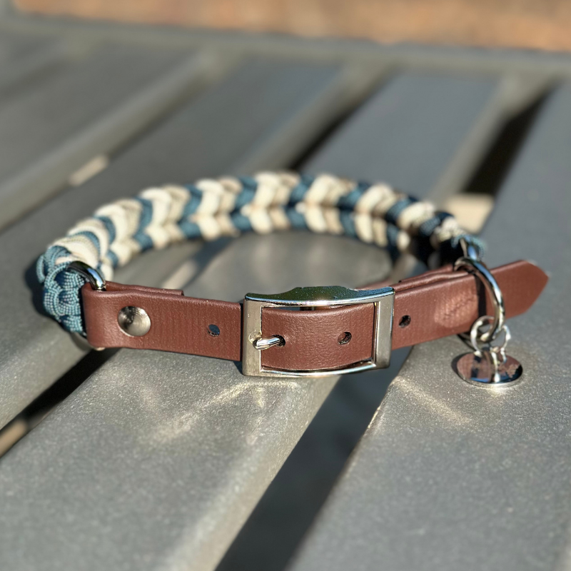 Dog collar with navy blue, tan, and cream braid, with dark brown biothane strap