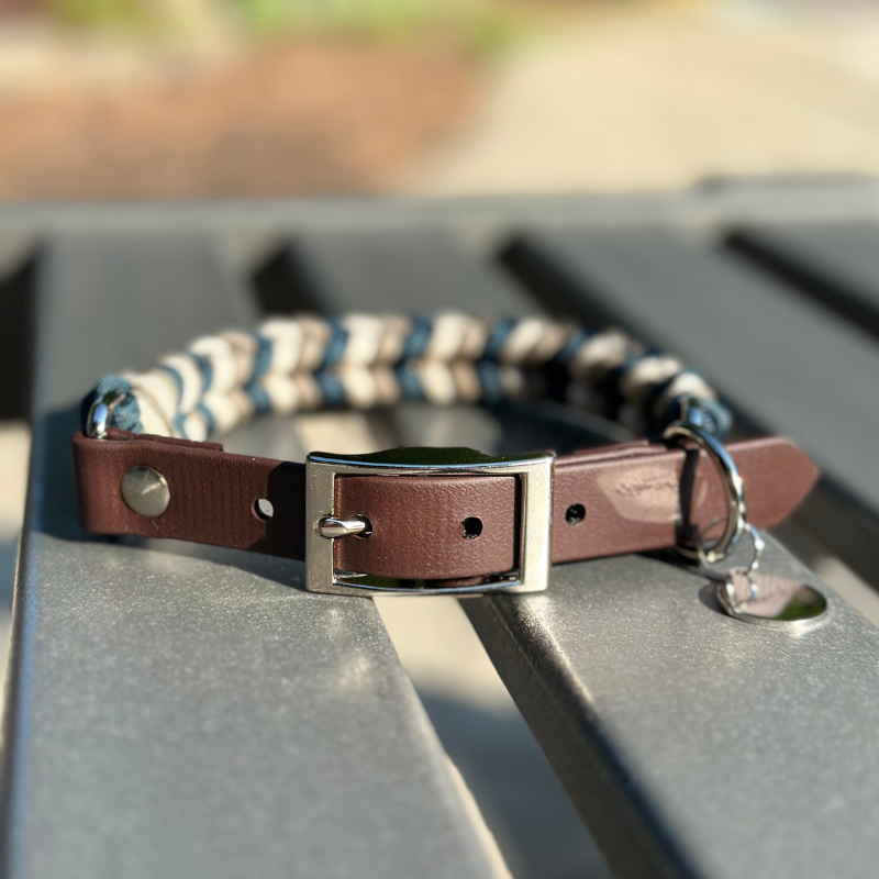 Dog collar with navy blue, tan, and cream braid, with dark brown biothane strap