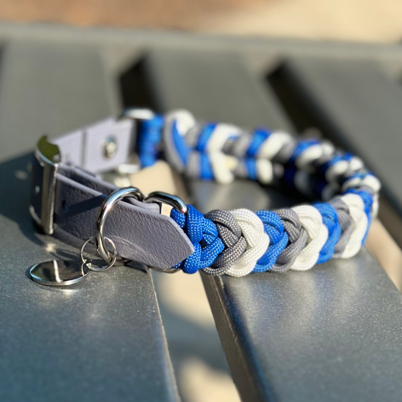 Dog Collar woven in royal blue, graphite gray, and white, with a gray adjustable strap with a belt style nickel plated buckle