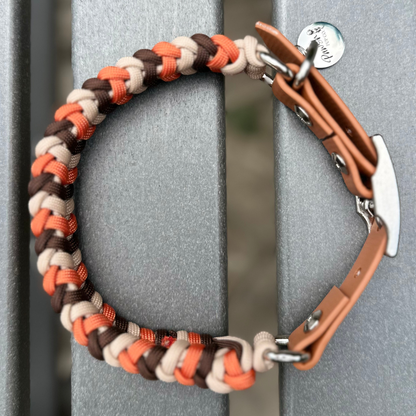 Brown, orange, and cream braided dog collar with light brown biothane strap and silver hardware