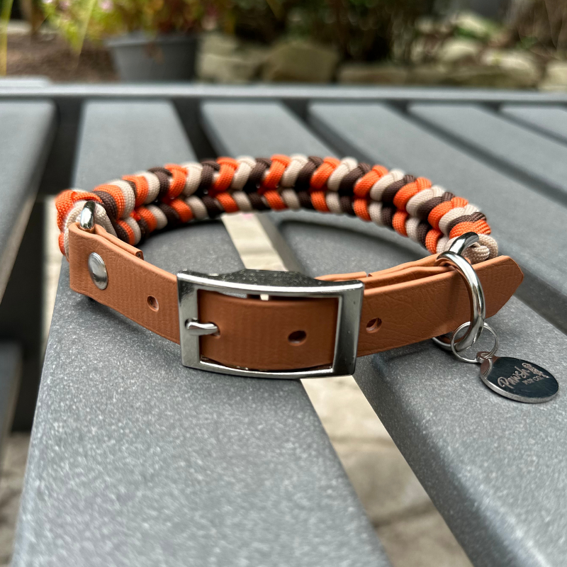Brown, orange, and cream braided dog collar with light brown biothane strap and silver hardware