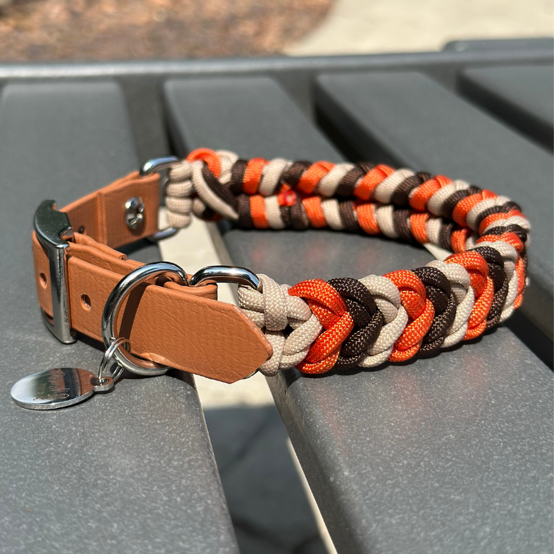 Brown, orange, and cream braided dog collar with light brown biothane strap and silver hardware