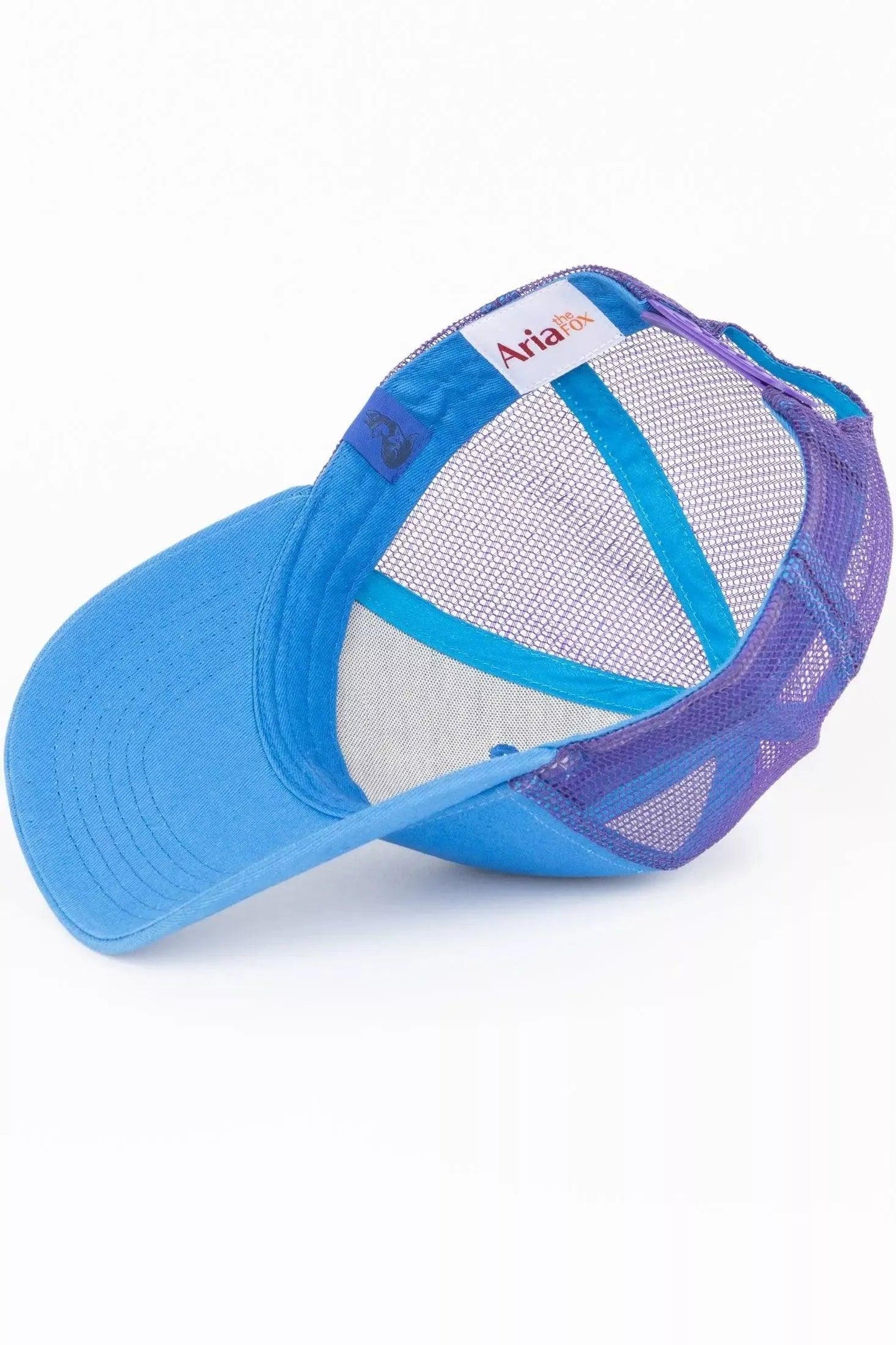 Blue cap with mesh back on a white background