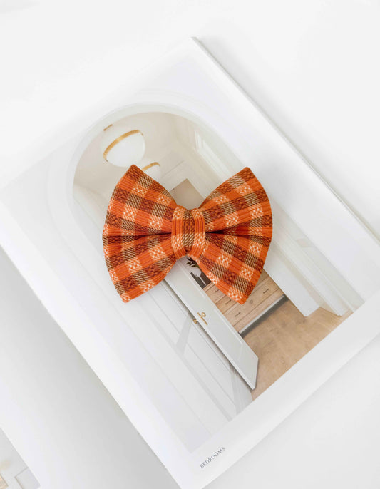 Plaid bow tie on a white background