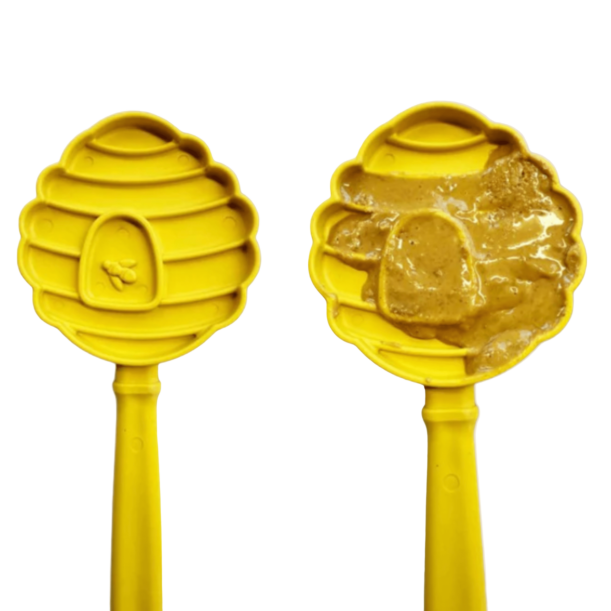 Two yellow honeycombs dog lick toys with peanut butter on a white background