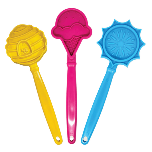 Three colorful dog lick sticks on a white background