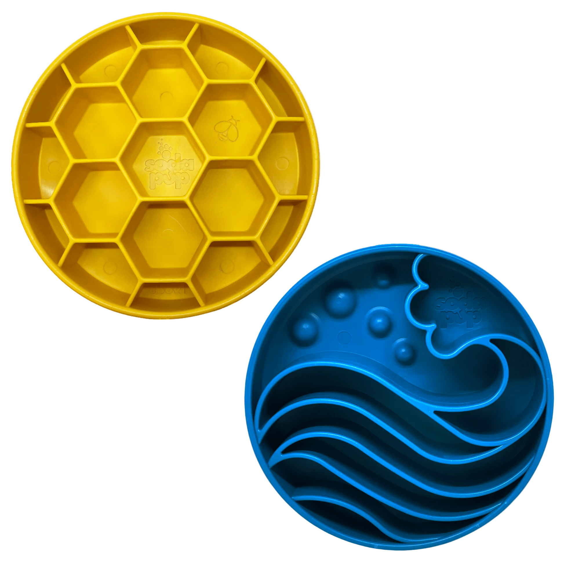Yellow honeycomb-patterned and blue wavy-patterned dog lick mats on a white background