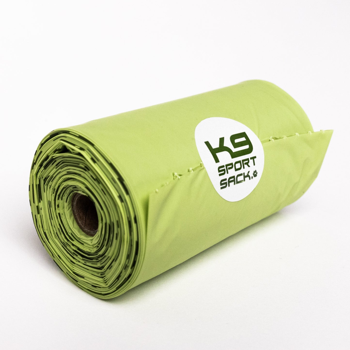 Roll of green K9 Sport Sack on a white background
