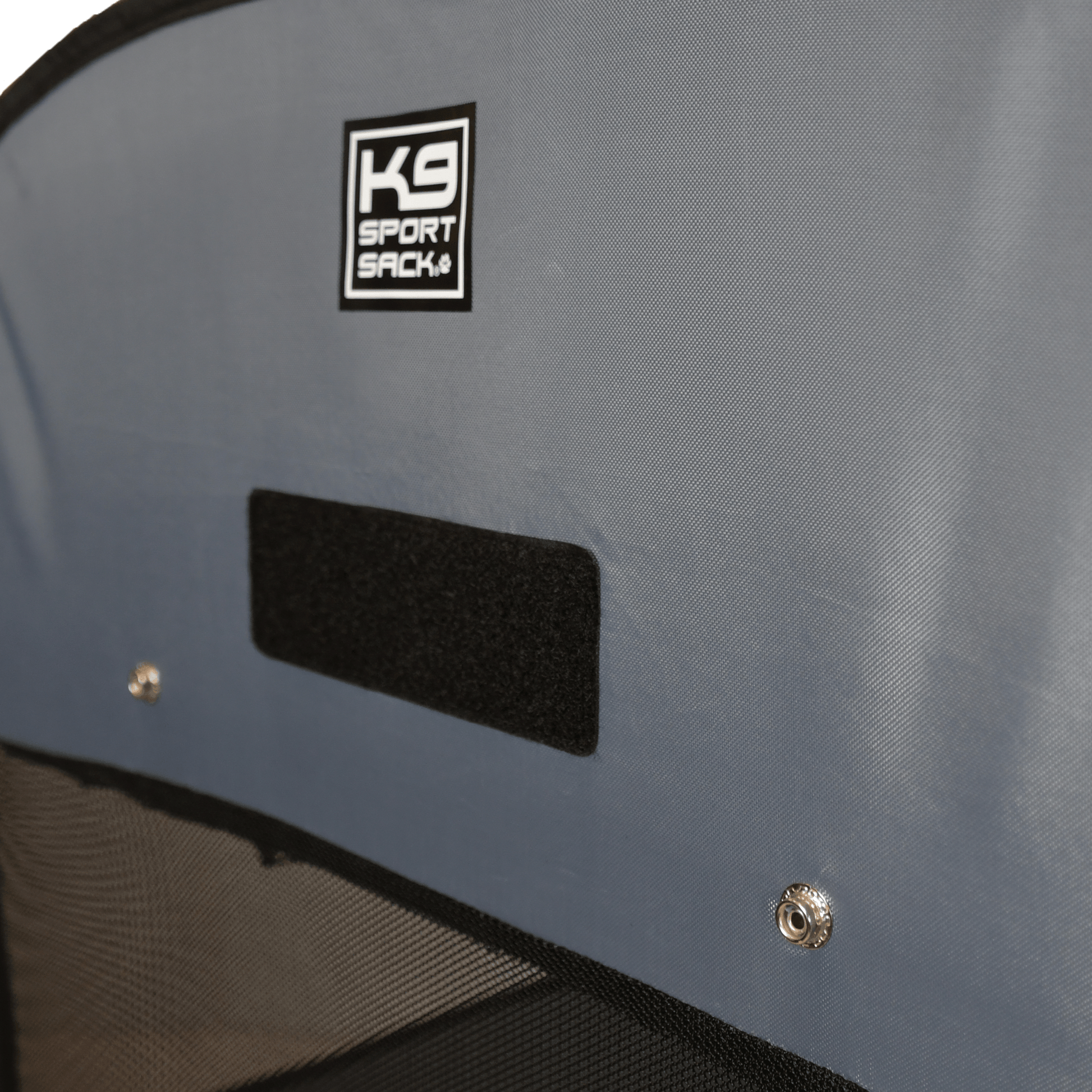 Gray backpack with K9 Sport logo on a gray background