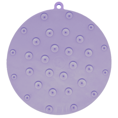 Purple silicone dog lick mat with suction cups on a white background