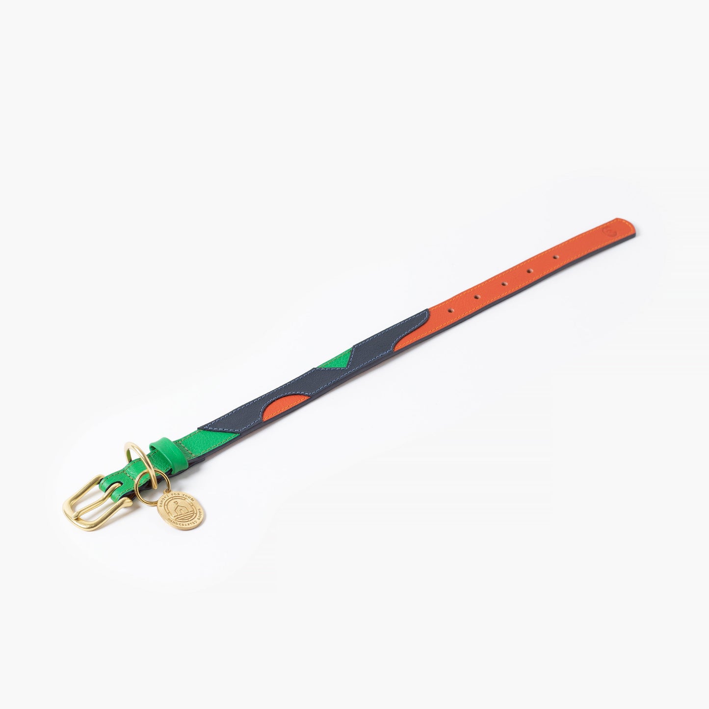 Colorful belt with a gold buckle on a white background