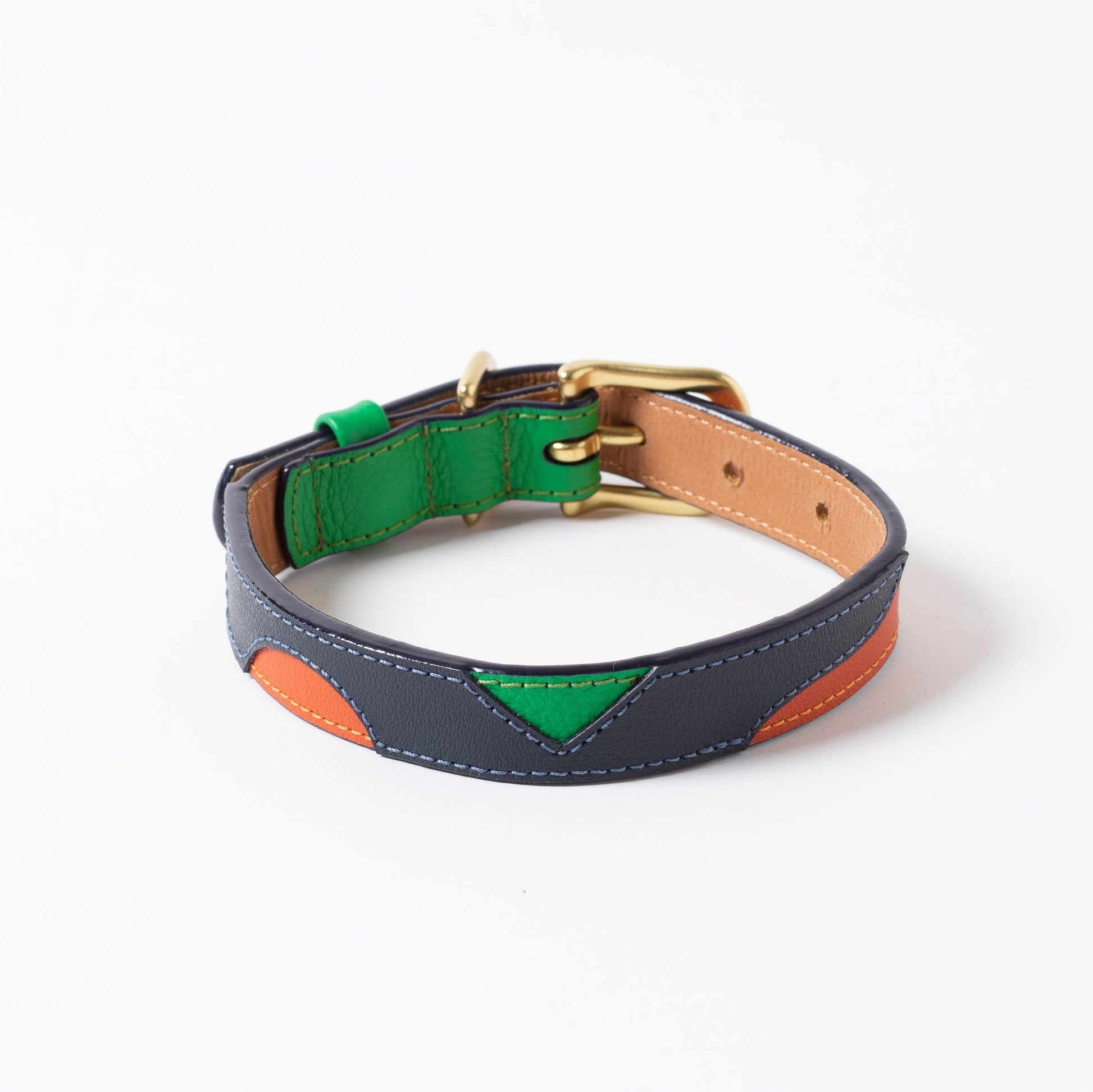 Multicolored leather dog collar on a white background