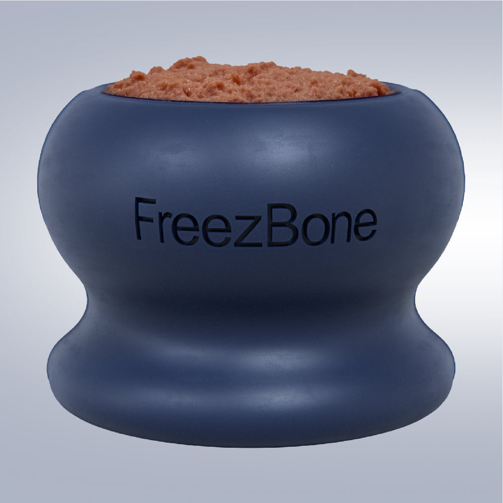 Blue FreezBone product with a brown substance on a gray background