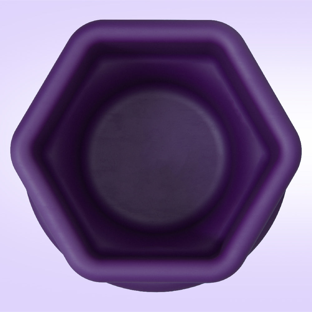 Hexagonal purple container on a light purple background
