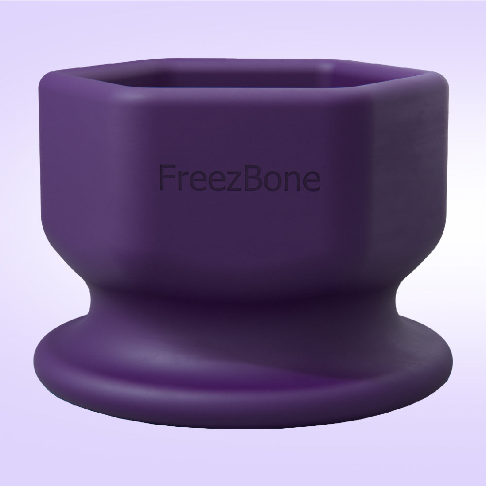 Purple silicone cup with 'FreezBone' branding on a light purple background
