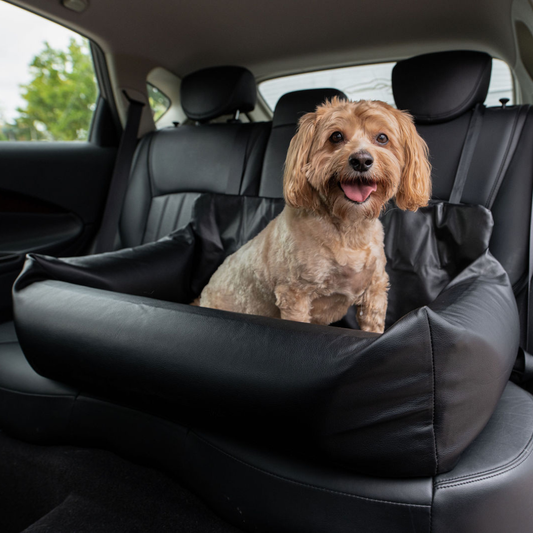 PupProtector™ Faux Leather Memory Foam Dog Car Bed in Black Dog in Car