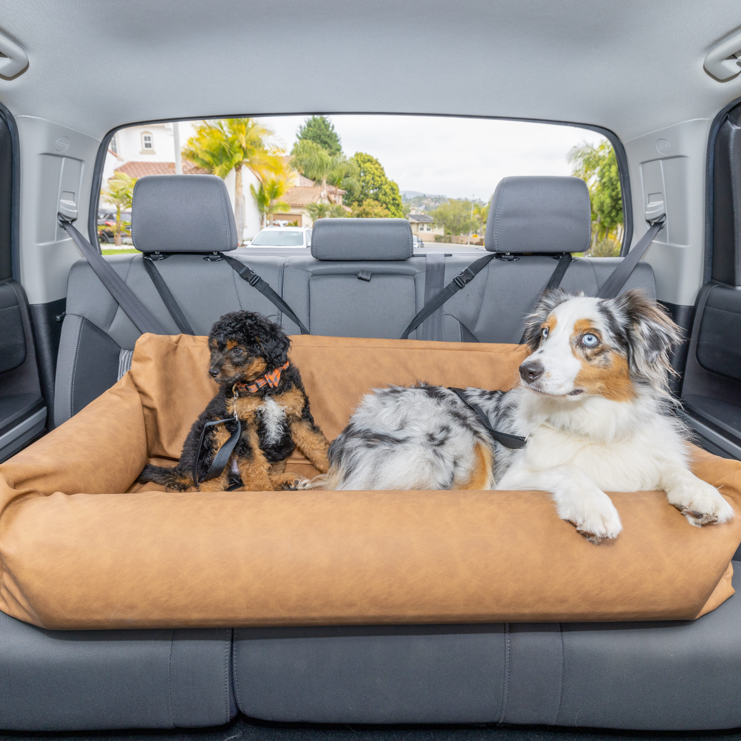 PupProtector™ Faux Leather Memory Foam Dog Car Bed in Camel two dogs full seat
