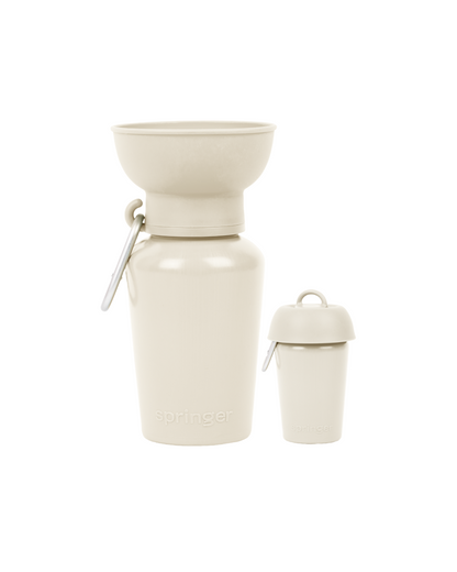 Set of two beige travel mugs with a carrying strap on a white background