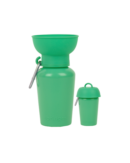 Green silicone water bottle with detachable lid on a white background