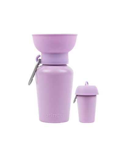Collapsible purple water bottle with carrying case on a white background
