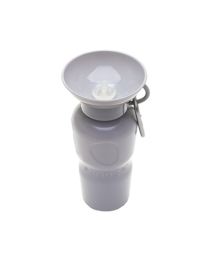 Gray travel dog water bottle with a detachable spout on a white background