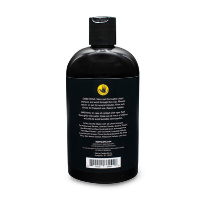 Black bottle with a label on a white background